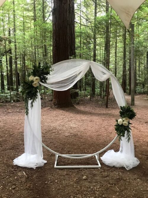 white wedding hoop $180.00 + GST
white organza drapes $30.00 + GST
floral arrangements price on inquiry